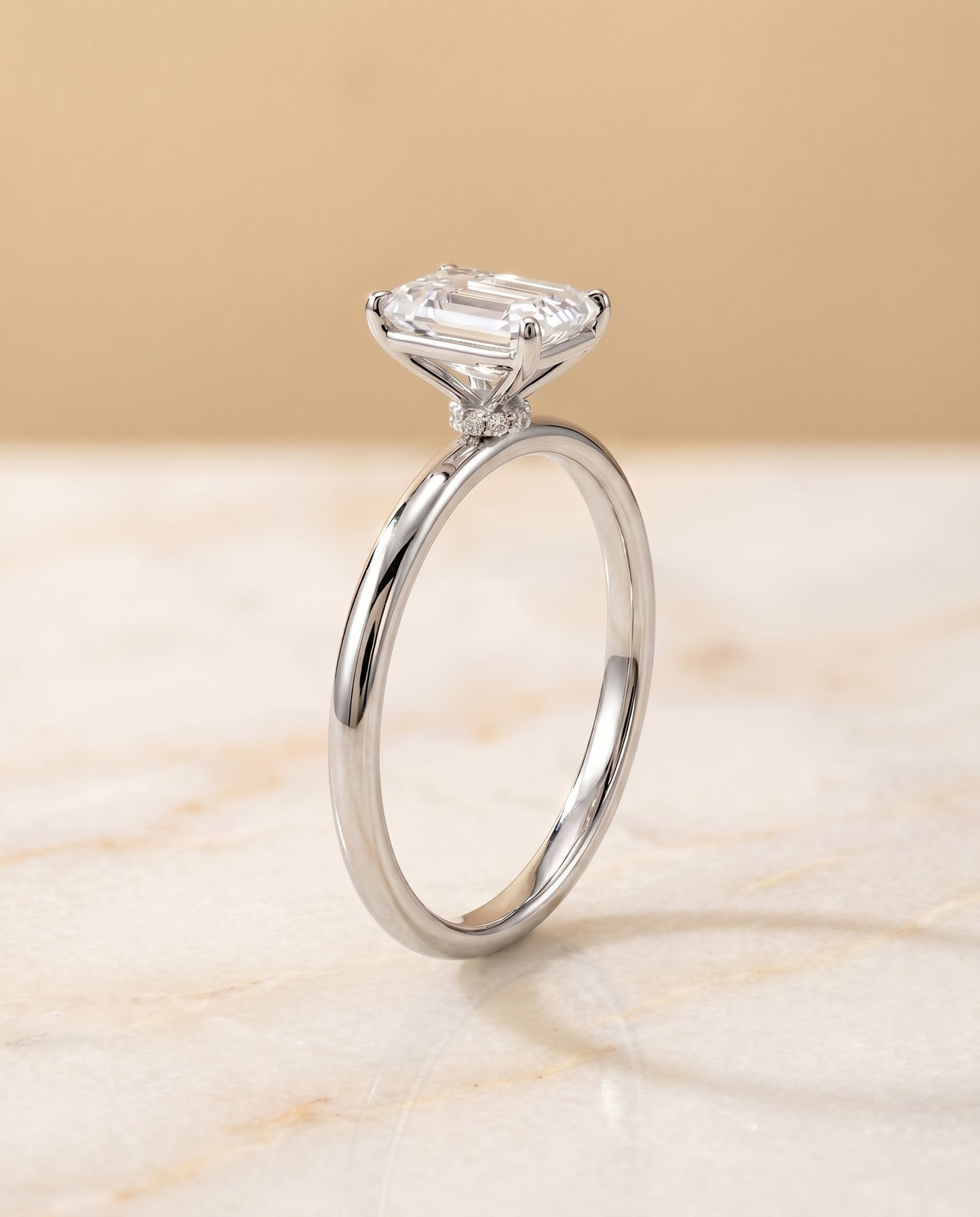 The Joni Hidden Halo Solitaire Engagement Ring Setting for Emerald Cut Diamonds in Platinum
