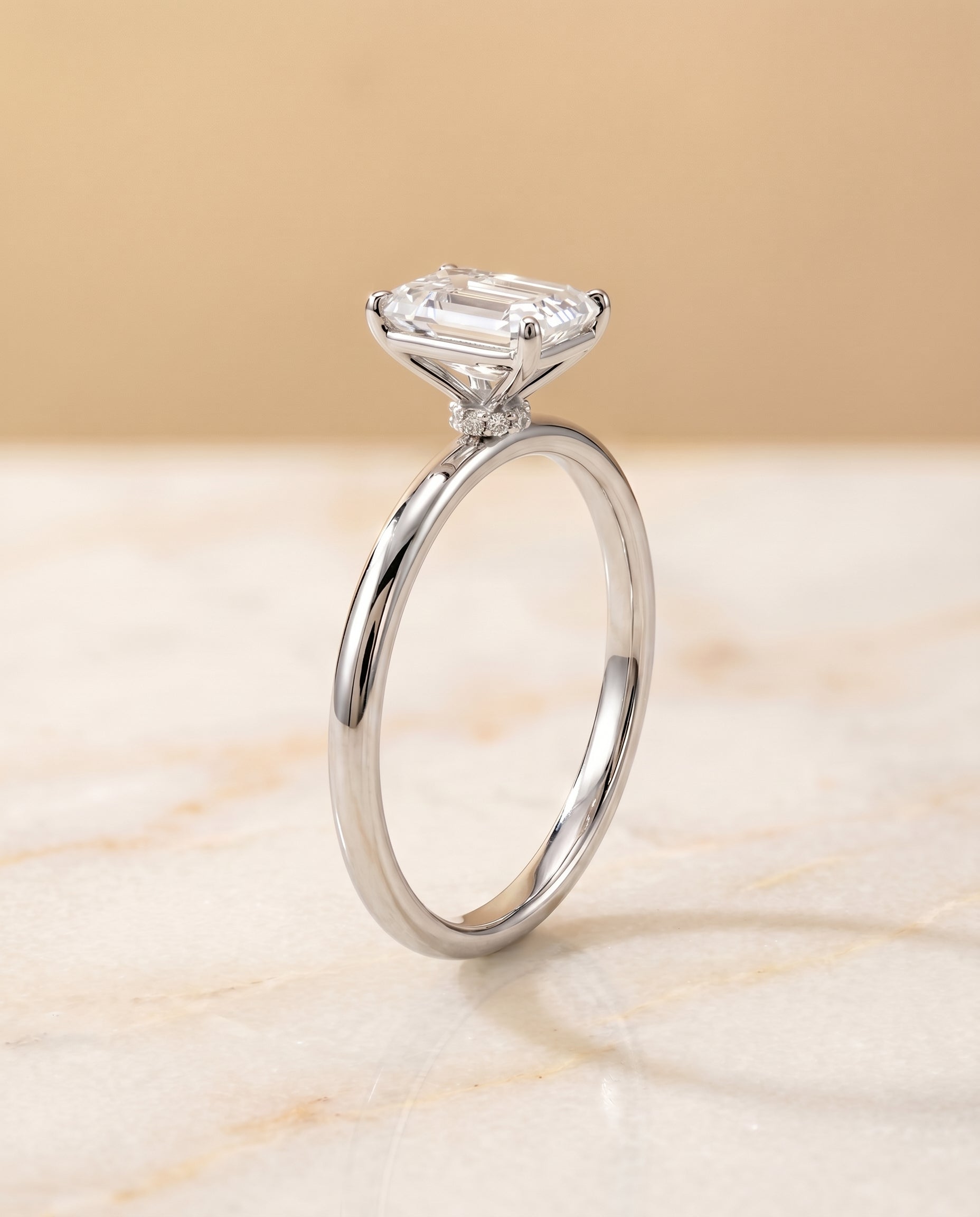 Hidden Halo Solitaire Cut styling on The Joni emerald engagement ring setting | RockHer