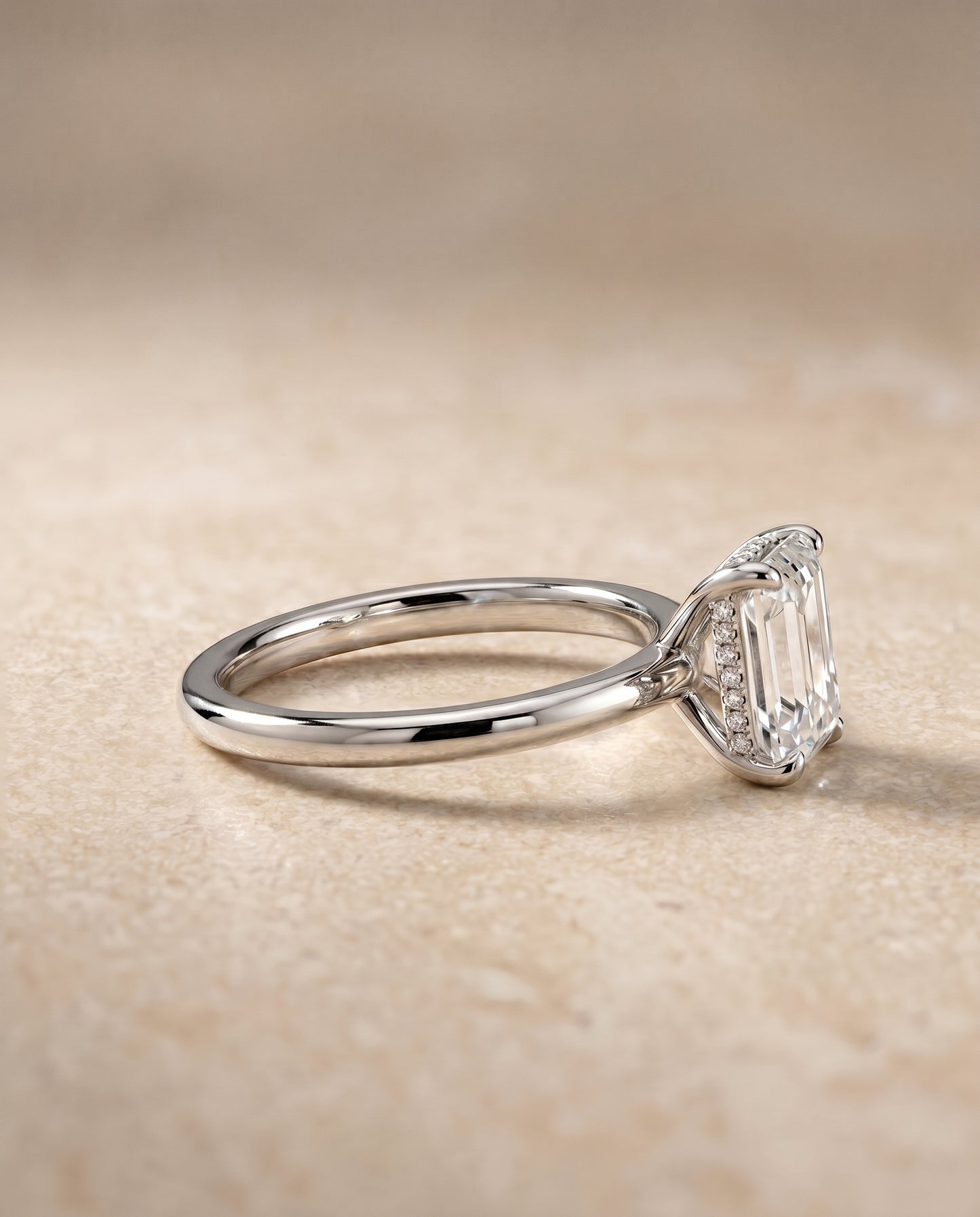 The Joni Hidden Halo Solitaire Engagement Ring Setting for Emerald Cut Diamonds in Platinum