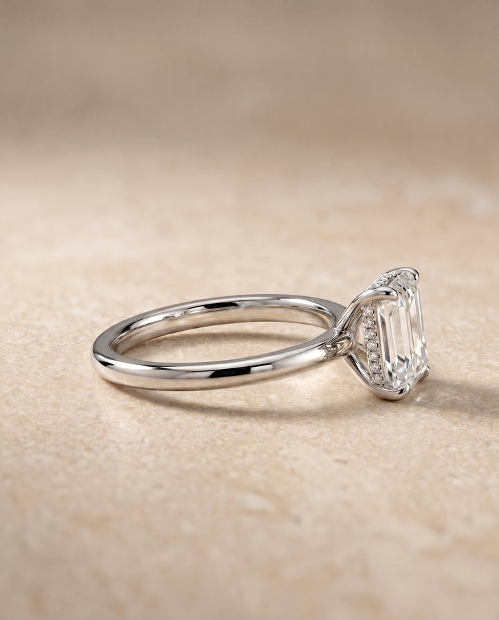 The Joni Hidden Halo Solitaire Engagement Ring Setting for Emerald Cut Diamonds in Platinum