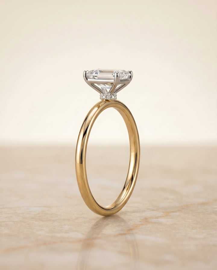The Joni Hidden Halo Solitaire Emerald Cut Engagement Ring Setting in 18K Yellow Gold