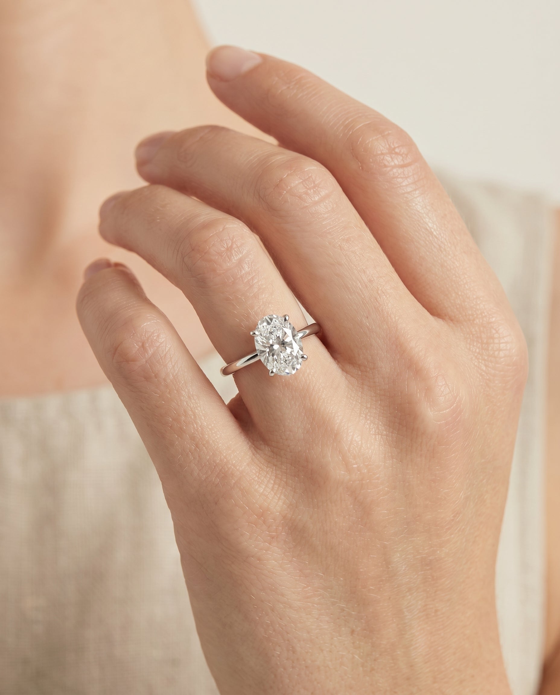 The Joni engagement ring setting in Platinum, hidden halo solitaire design | RockHer