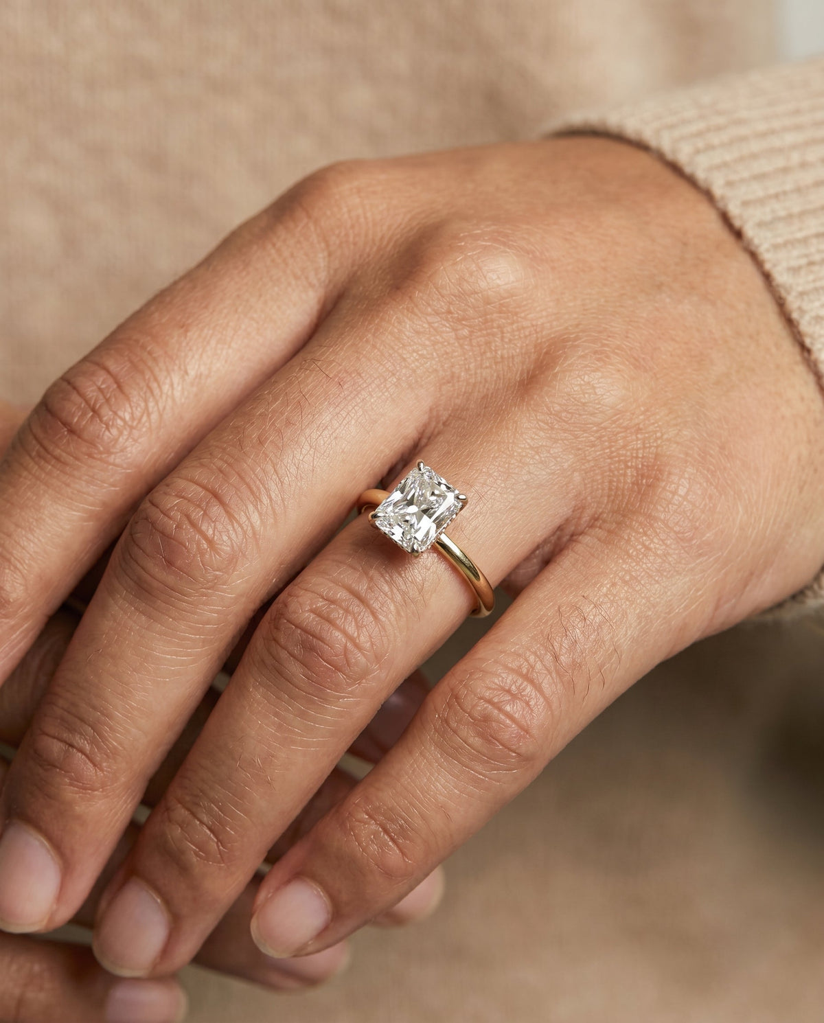 Joni Select Hidden Halo Radiant Cut Lab Diamond Engagement Ring in 18K Yellow Gold, shown on hand | RockHer