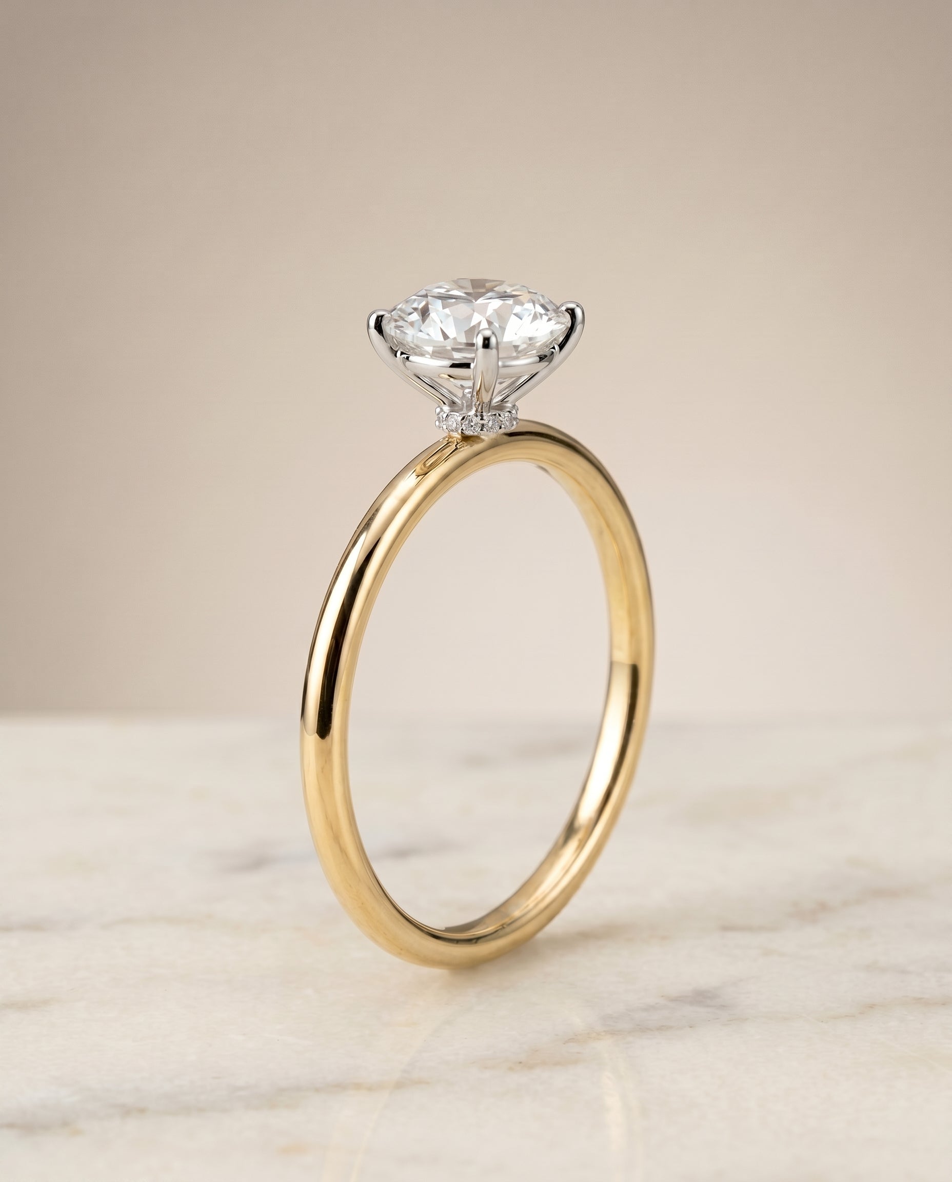 Hidden Halo Solitaire styling on The Joni round engagement ring setting | RockHer