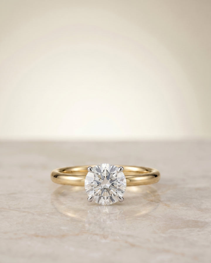 The Joni Hidden Halo Solitaire Round Engagement Ring Setting in 18K Yellow Gold