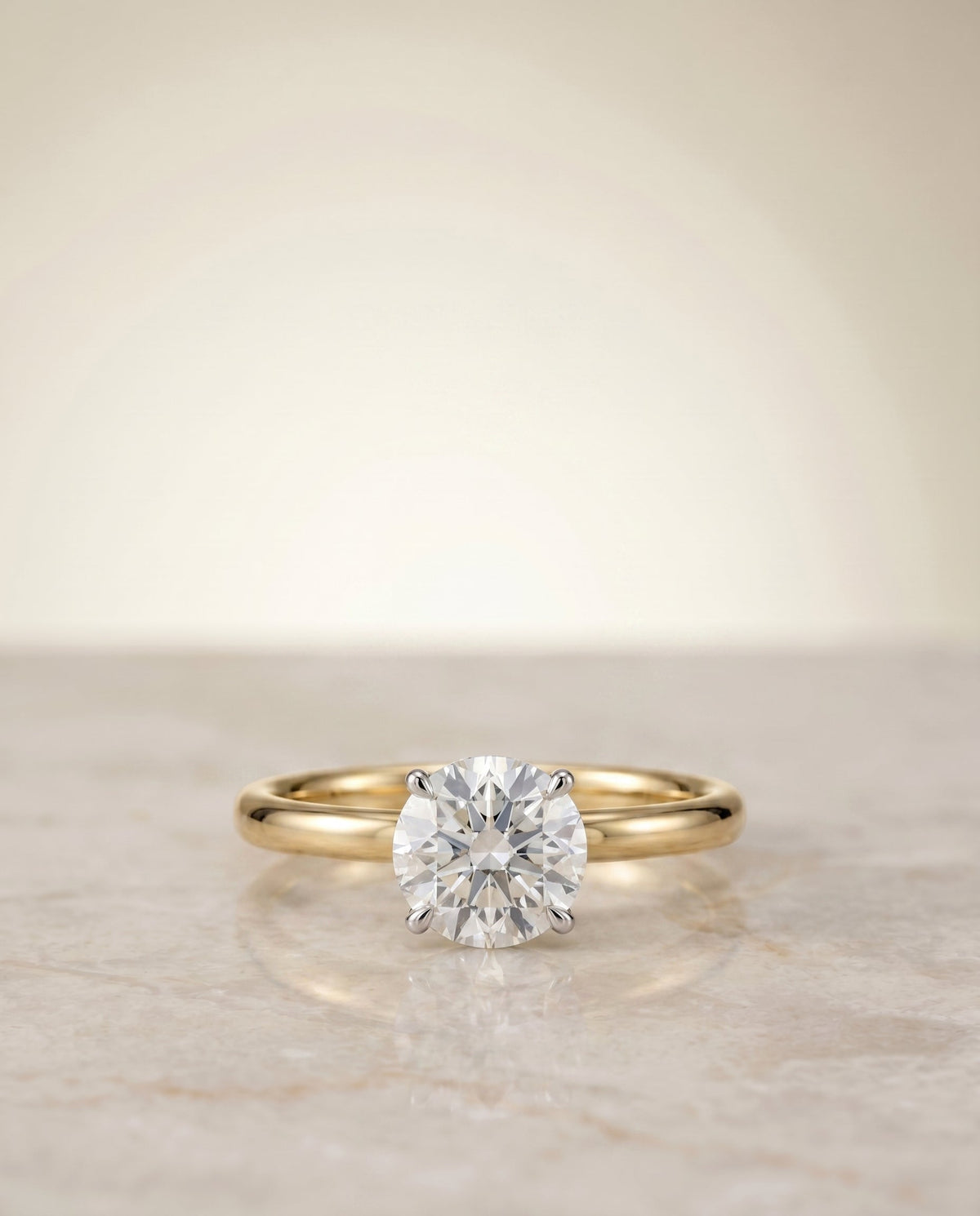 Joni Select Hidden Halo Solitaire Round Lab Diamond Engagement Ring in 18K Yellow Gold, shown on hand, angled | RockHer