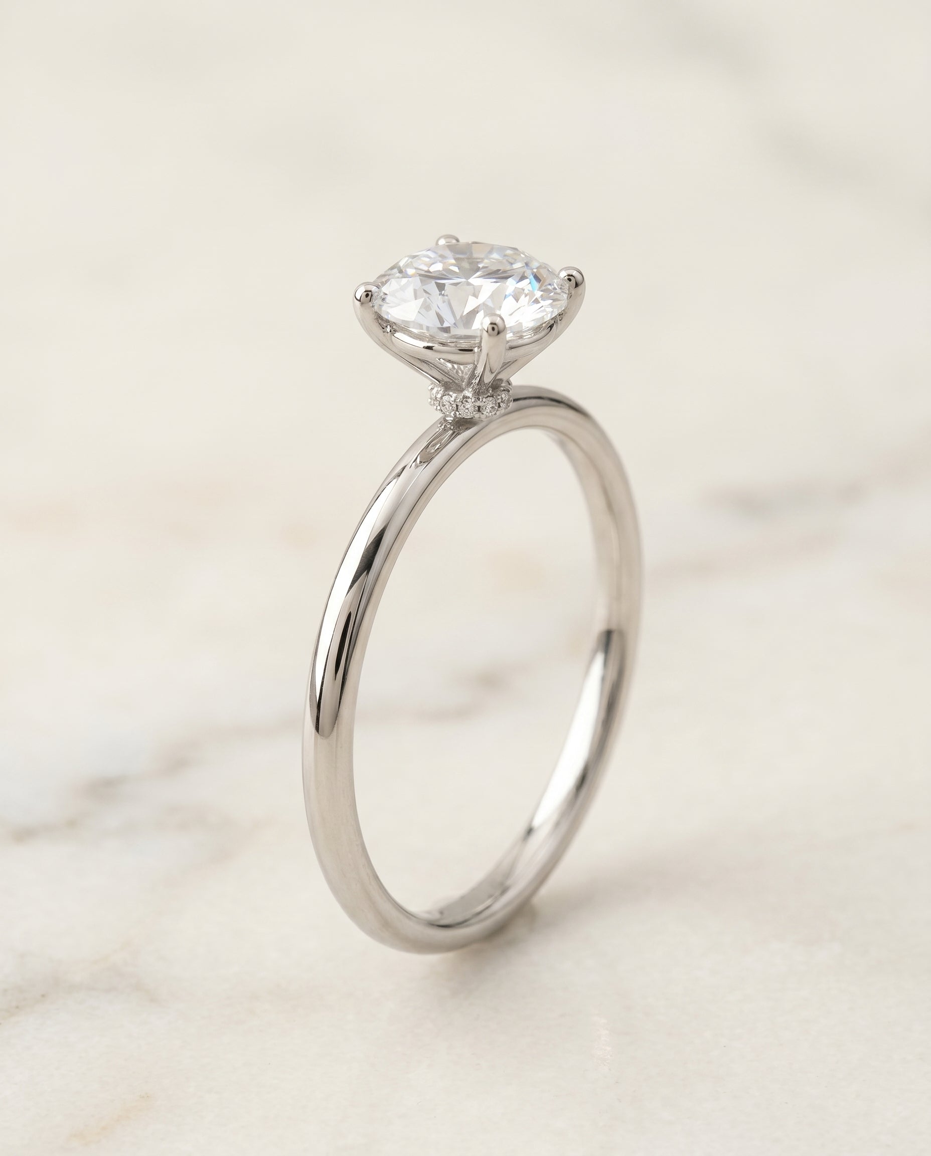 Hidden Halo Solitaire styling on The Joni round engagement ring setting | RockHer
