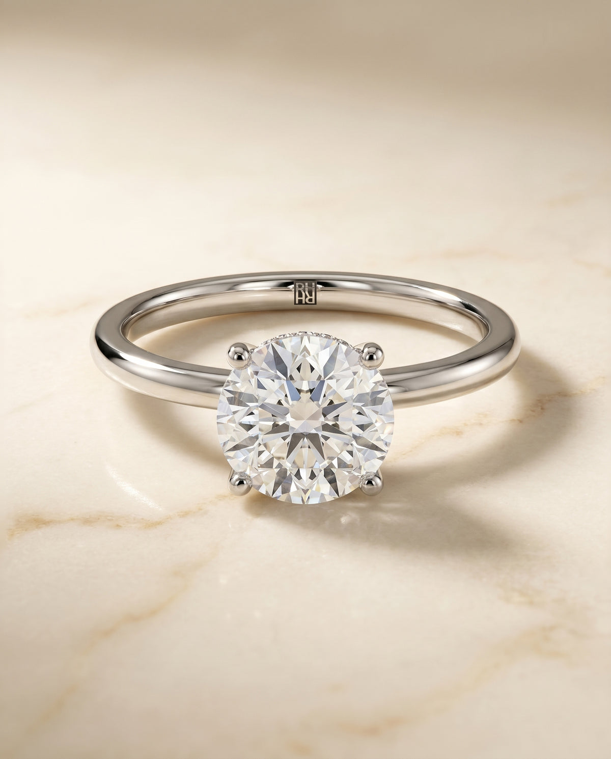 The Joni Hidden Halo Solitaire Engagement Ring Setting for Round Diamonds in Platinum | RockHer