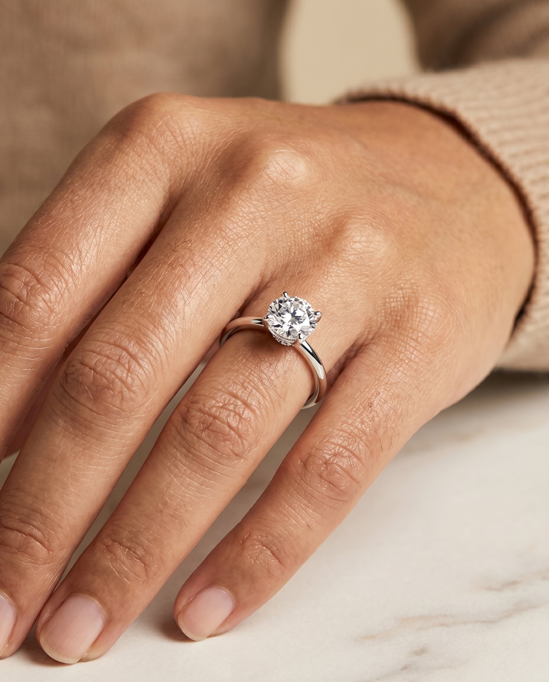 The Joni engagement ring setting in Platinum, hidden halo solitaire design | RockHer