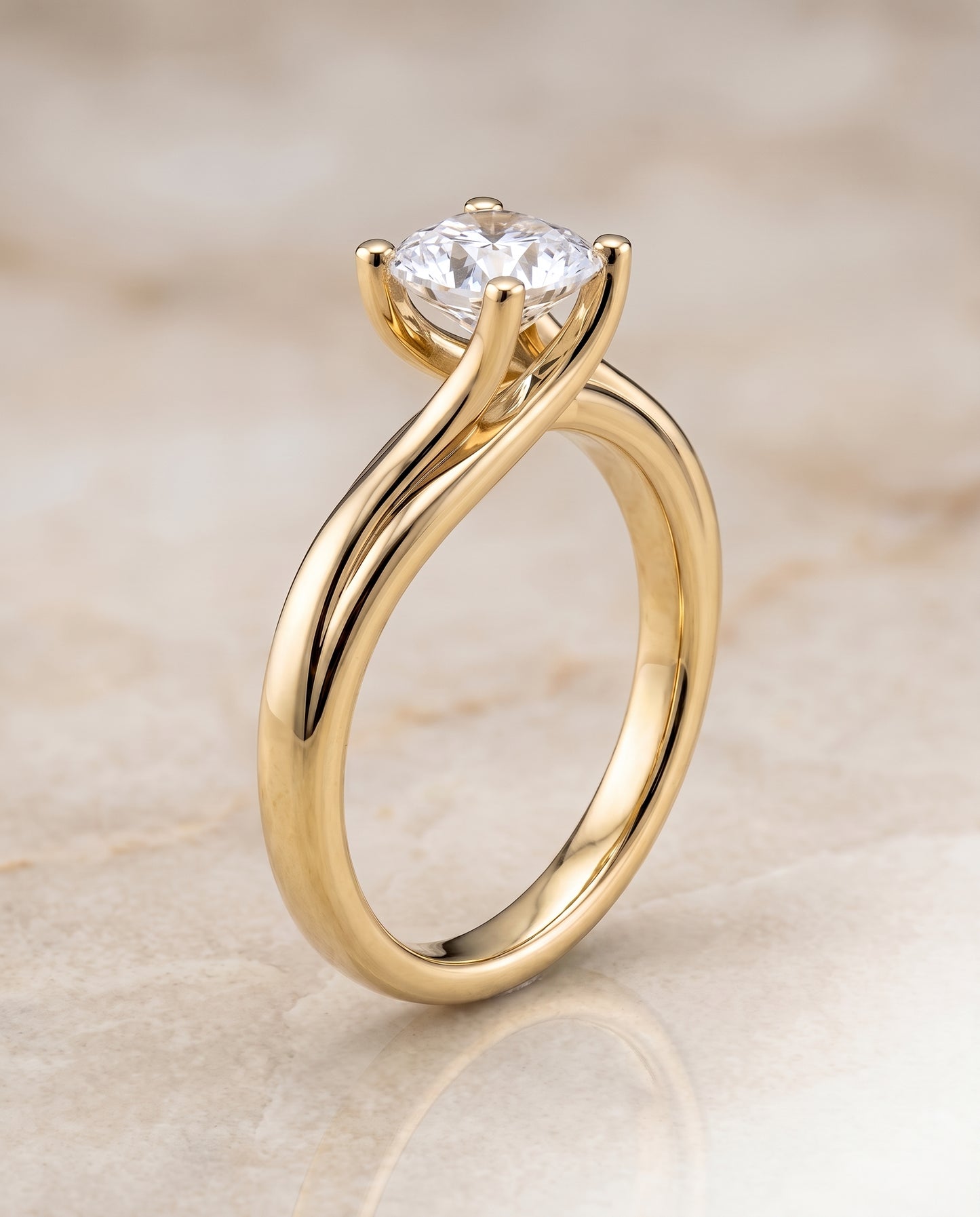 The Joplin Twisted Bypass Solitaire Cushion Cut Engagement Ring Setting in 18K Yellow Gold