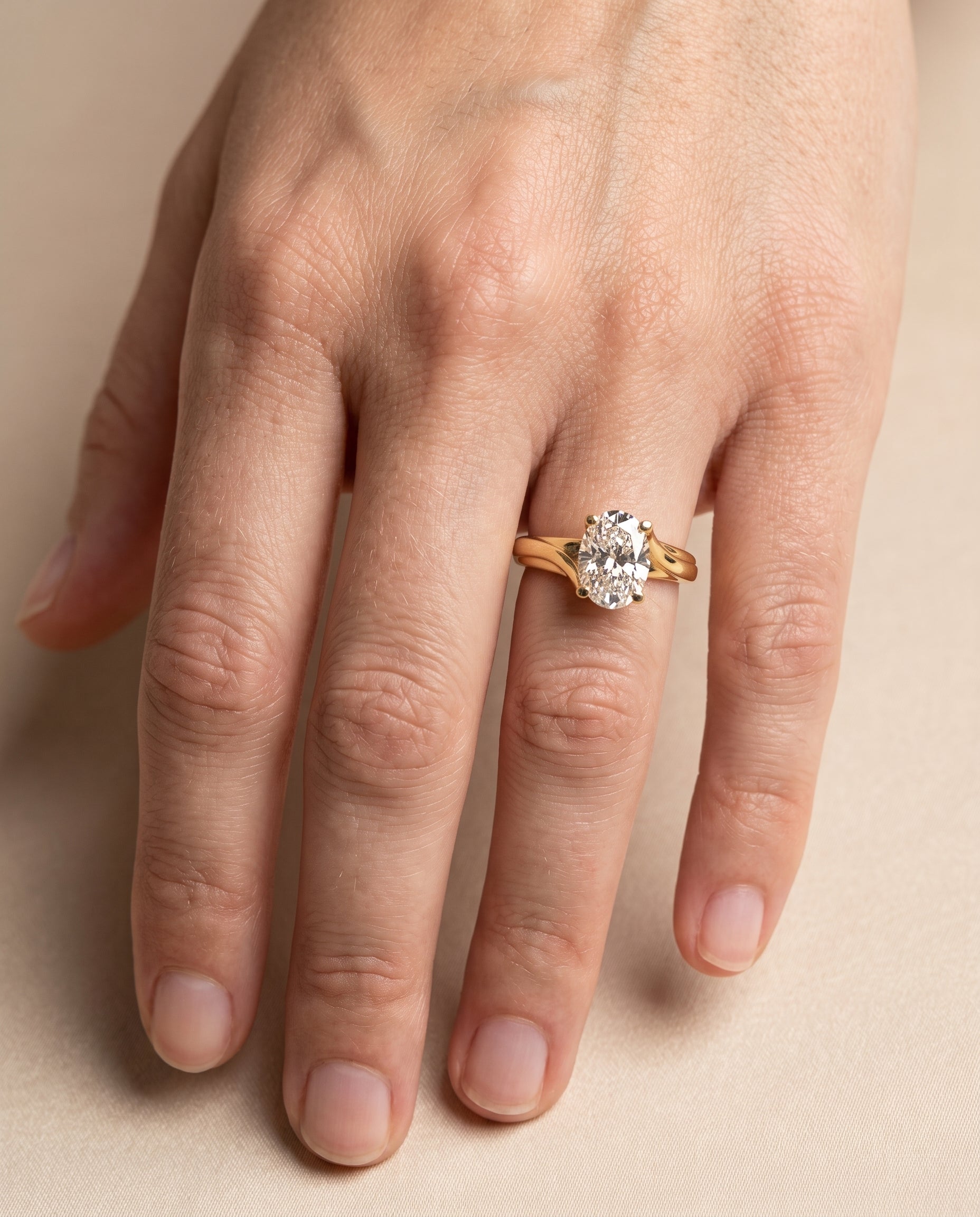 The Joplin engagement ring setting in 18K Yellow Gold, twisted bypass solitaire design | RockHer