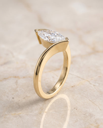 The Julia Bezel Tension Set Solitaire Marquise Engagement Ring Setting in 18K Yellow Gold