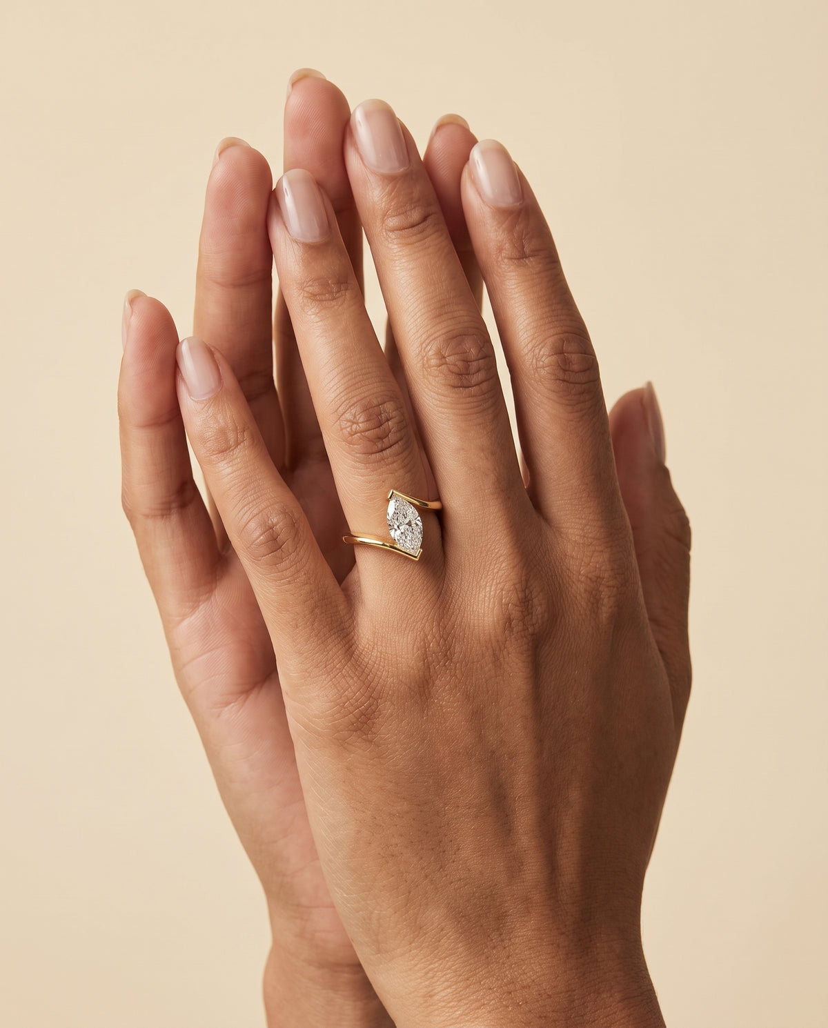 The Julia Bezel Tension Set Solitaire Marquise Engagement Ring Setting in 18K Yellow Gold