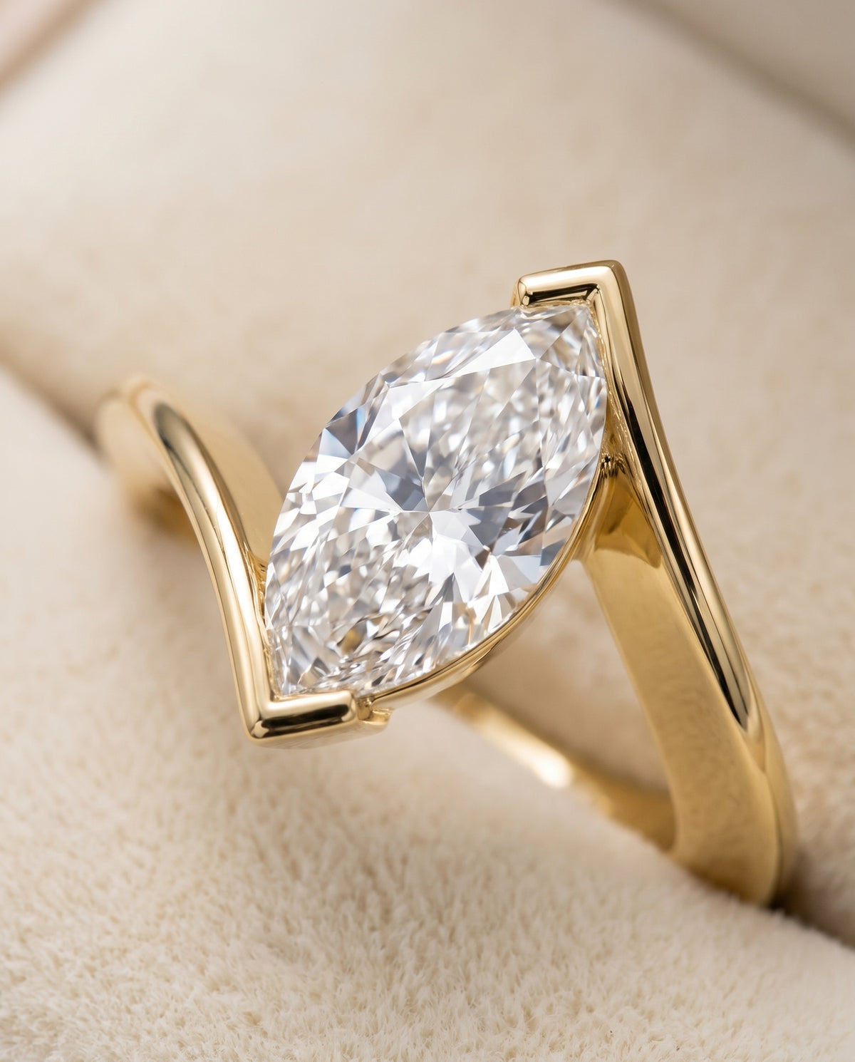 The Julia Bezel Tension Set Solitaire Marquise Engagement Ring Setting in 18K Yellow Gold