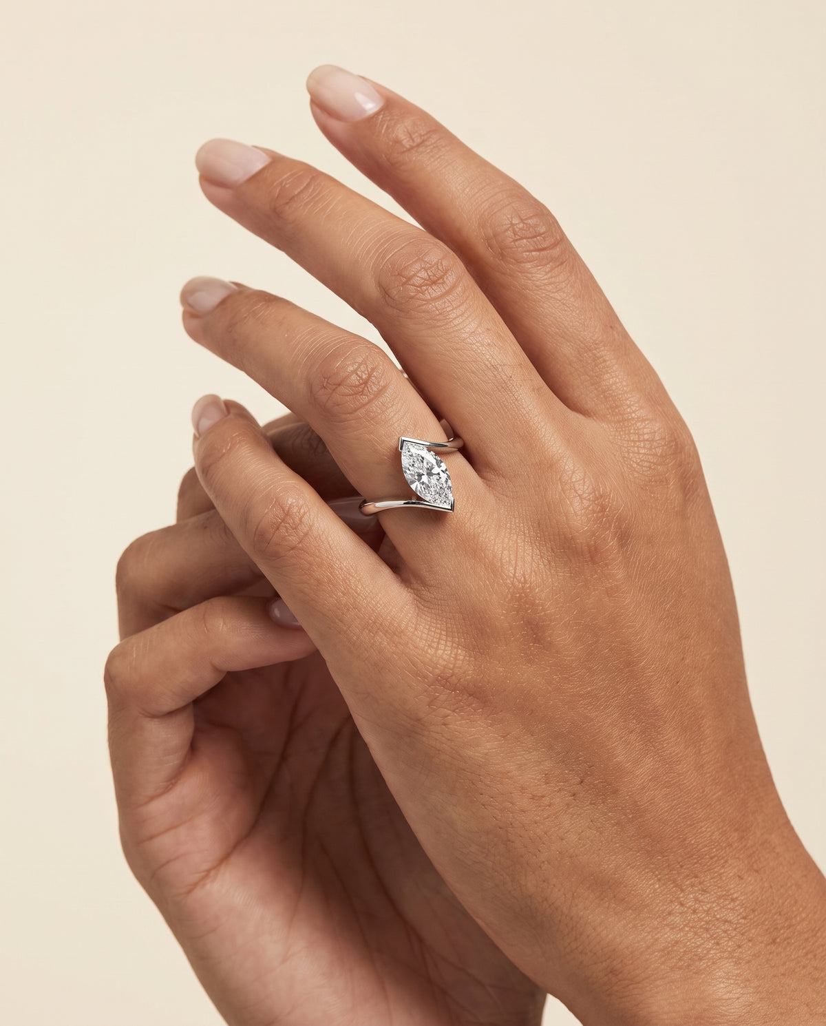 The Julia Bezel Tension Set Solitaire Marquise Engagement Ring Setting in Platinum