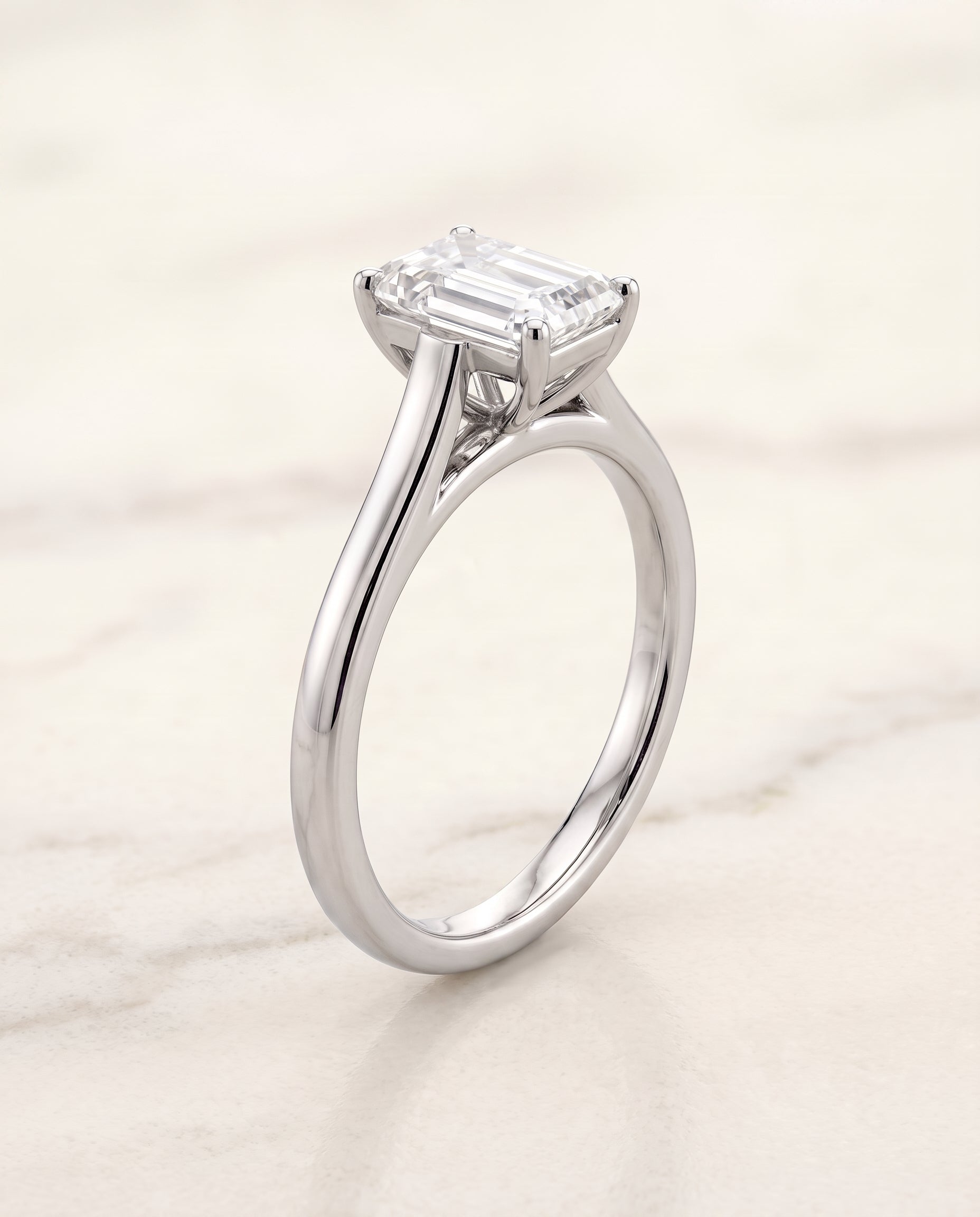 The Juliette setting for emerald diamonds, made to order in Platinum | RockHer