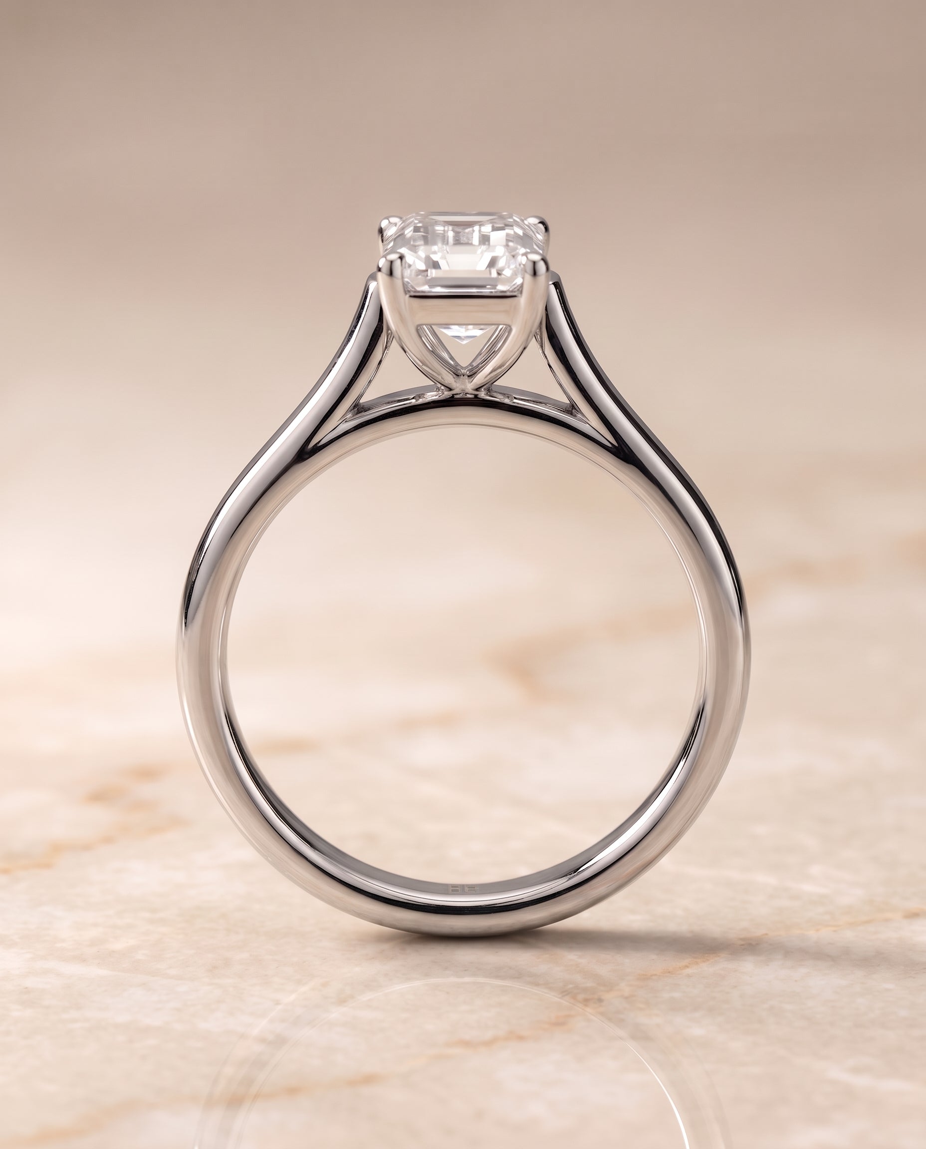 Elegant Cathedral Squared Edge Solitaire Cut styling on The Juliette emerald engagement ring setting | RockHer