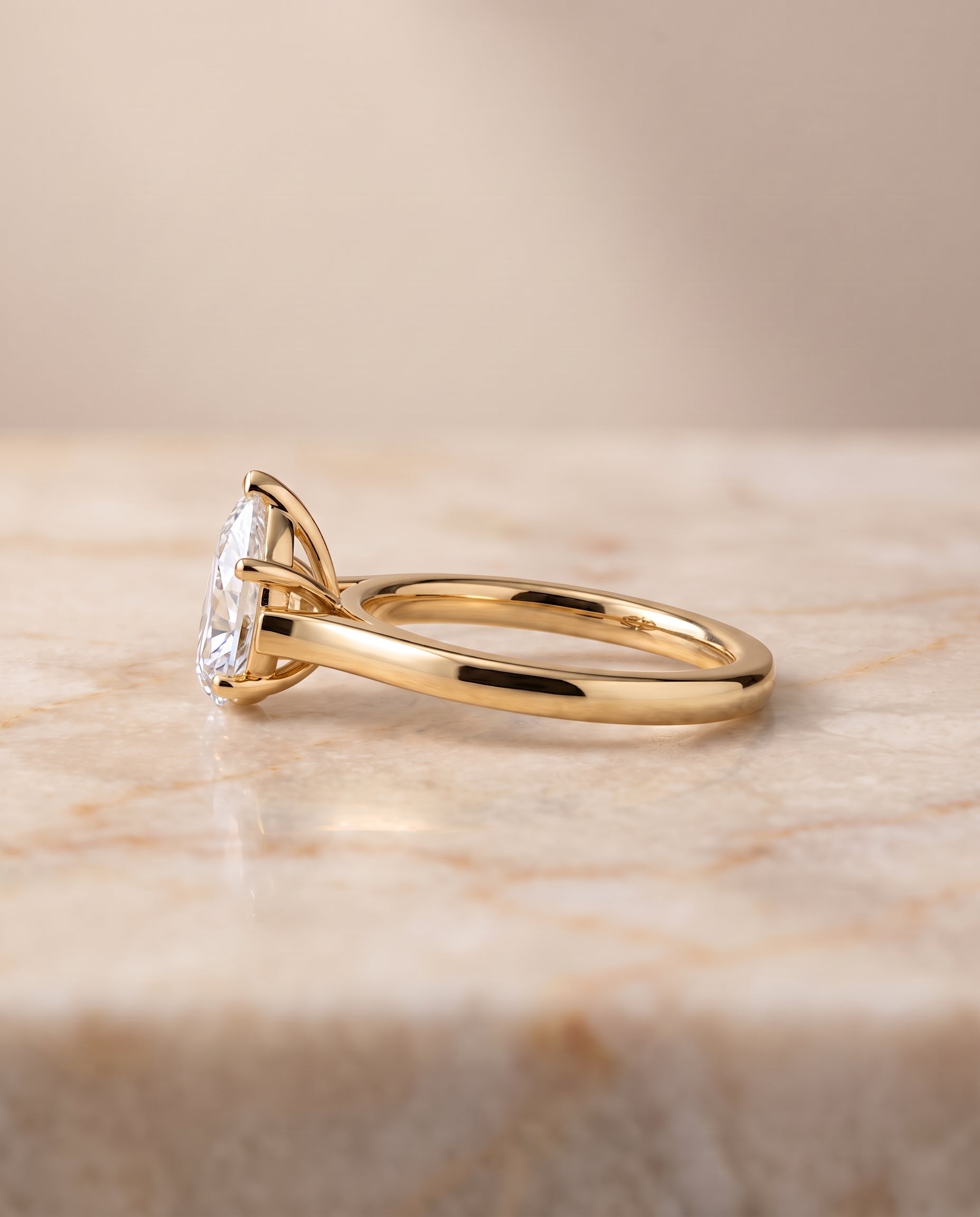 The Juliette setting for pear diamonds, made to order in 18K Yellow Gold | RockHer