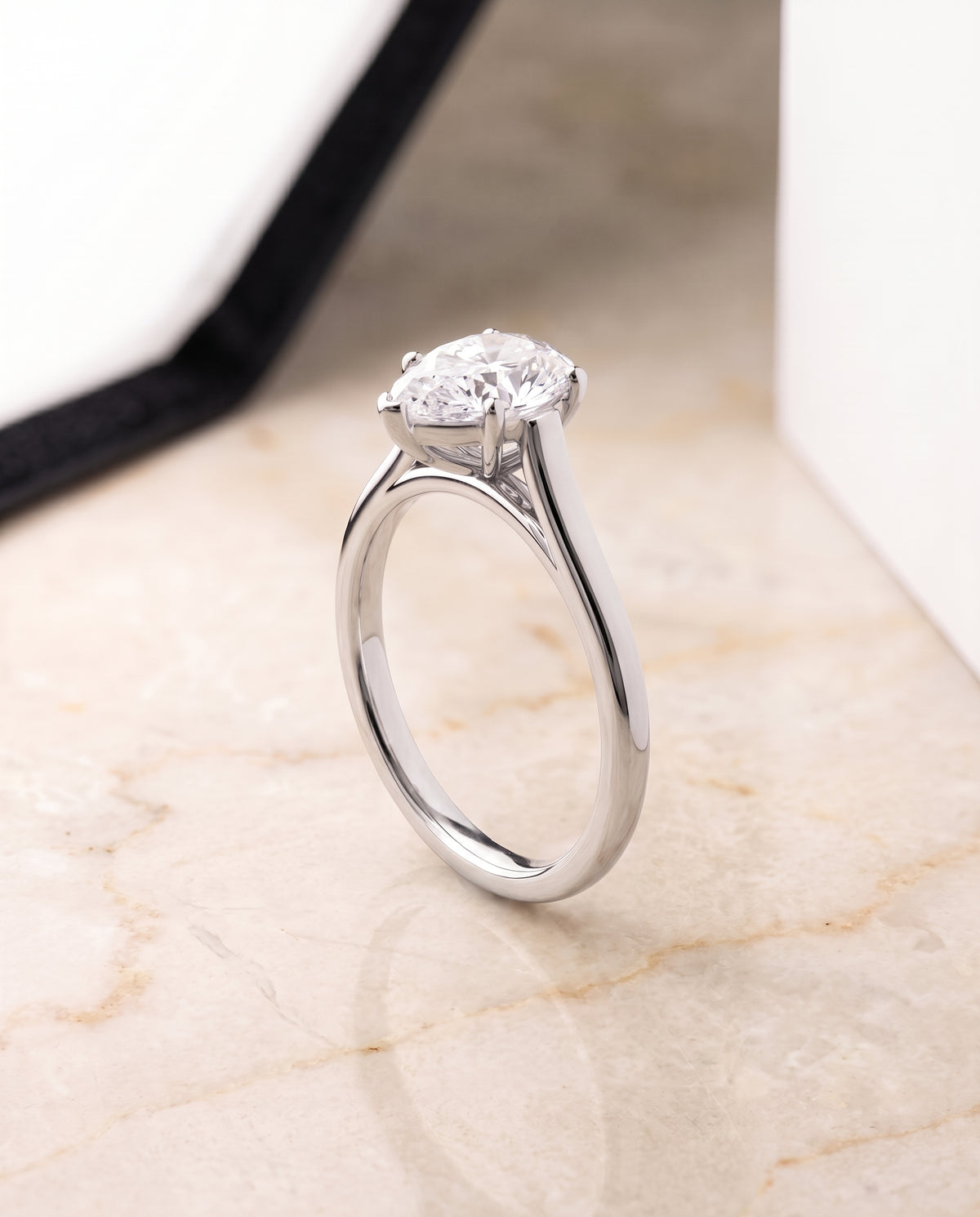 The Juliette Elegant Cathedral Squared Edge Solitaire Pear Engagement Ring Setting in Platinum