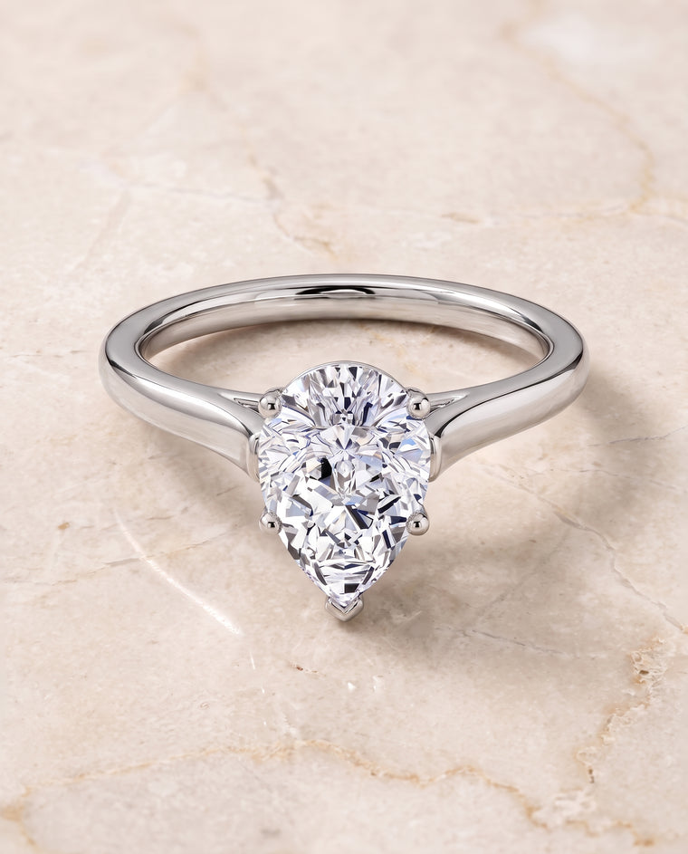 The Juliette Elegant Cathedral Squared Edge Solitaire Pear Engagement Ring Setting in Platinum