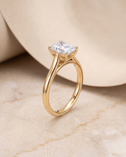 The Juliette Elegant Cathedral Squared Edge Solitaire Radiant Cut Engagement Ring Setting in 18K Yellow Gold