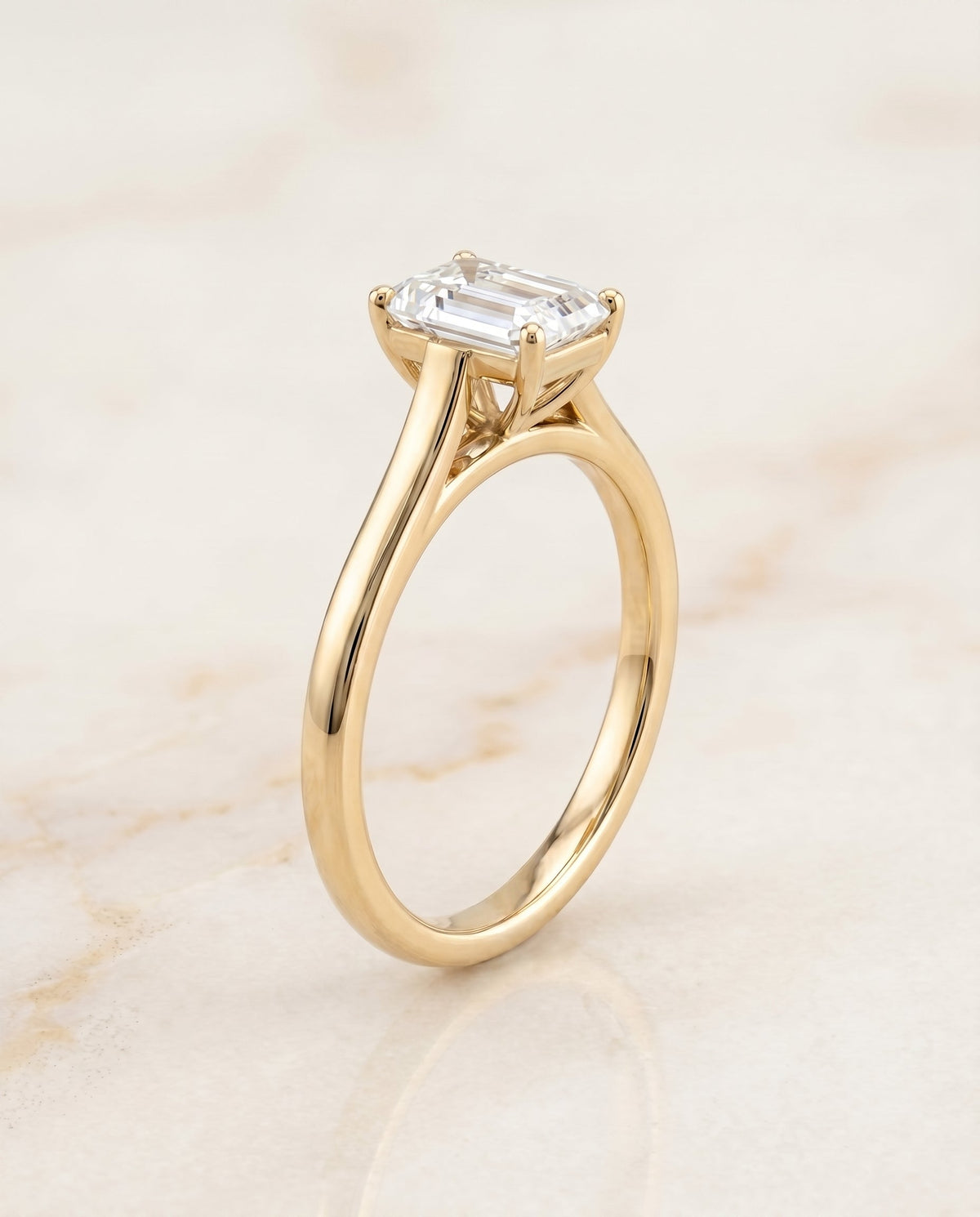 Juliette Select Cathedral Solitaire Emerald Cut Lab Diamond Engagement Ring in 18K Yellow Gold, front view | RockHer