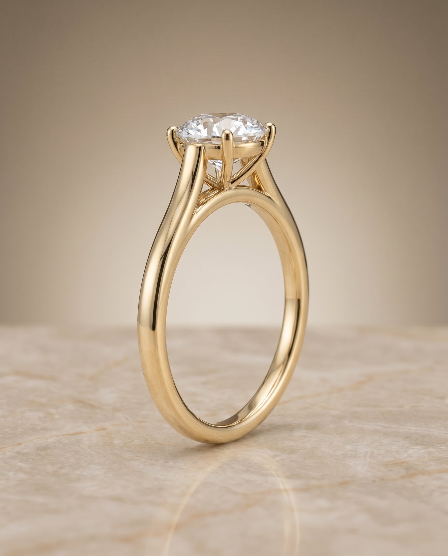 The Juliette setting for round diamonds, made to order in 18K Yellow Gold | RockHer