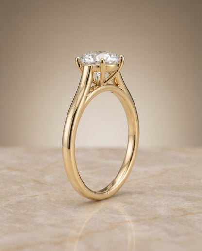 Juliette Select Cathedral Solitaire Round Lab Diamond Engagement Ring in 18K Yellow Gold, shown on hand, angled | RockHer