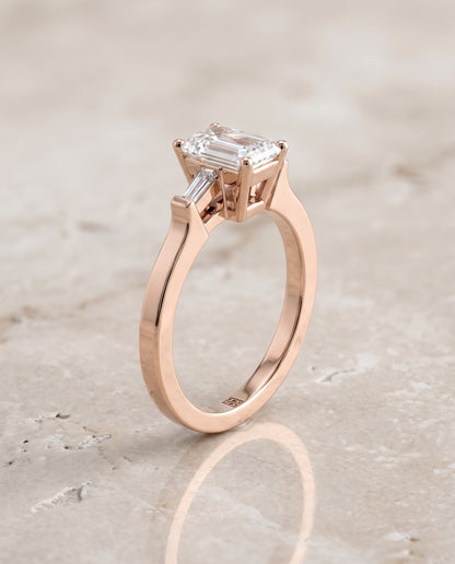 The June Three Stone Emerald Cut Engagement Ring Setting in 14K Rose Gold