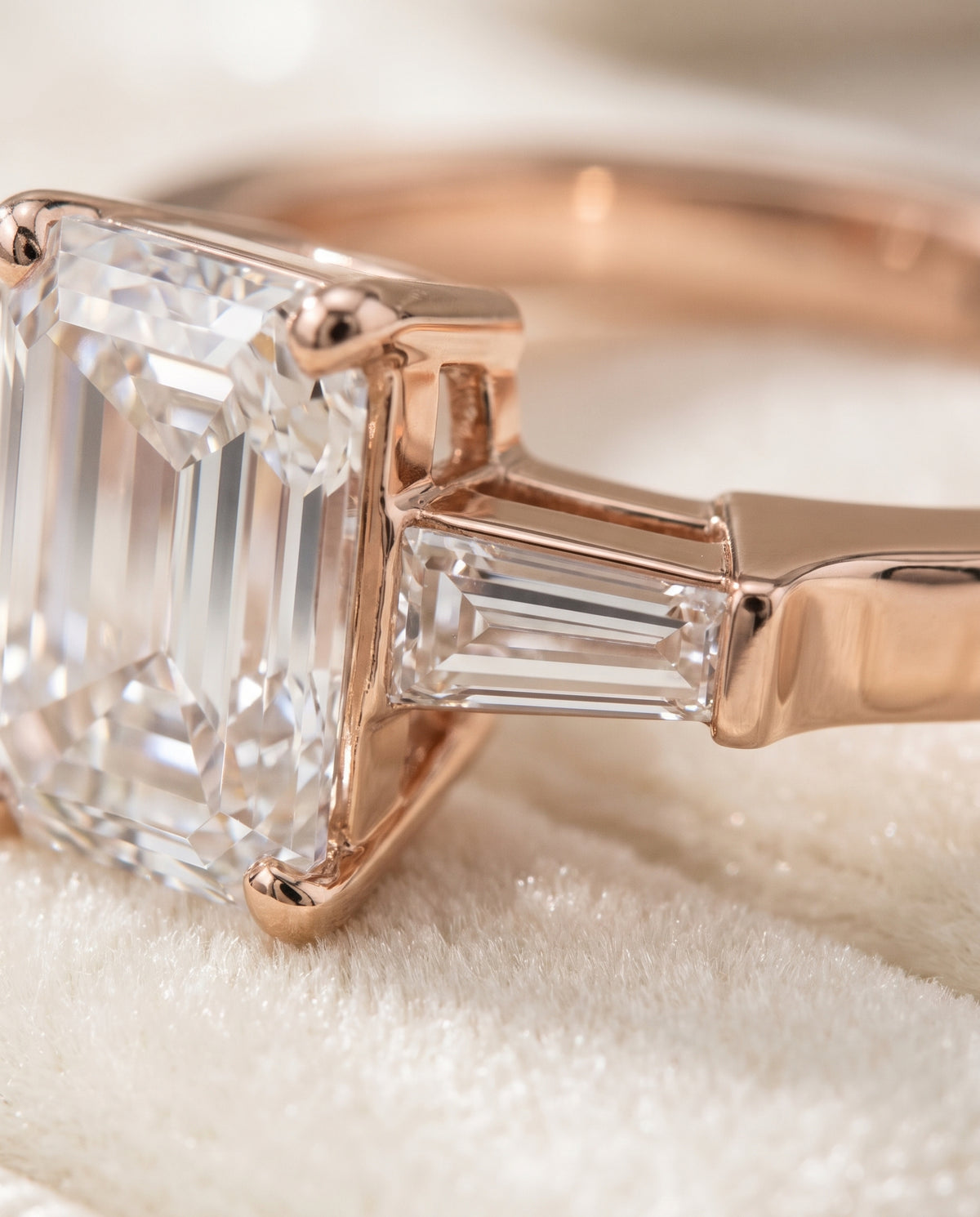 The June Three Stone Emerald Cut Engagement Ring Setting in 14K Rose Gold