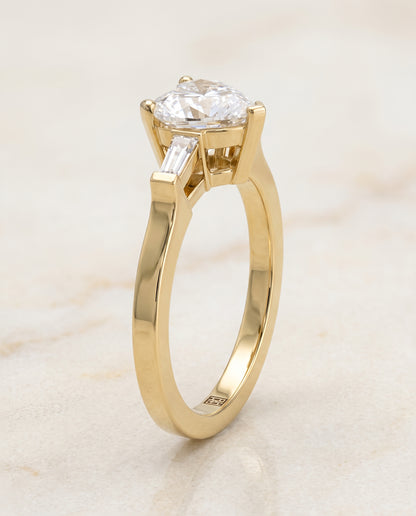 The June Three Stone Heart Engagement Ring Setting in 18K Yellow Gold