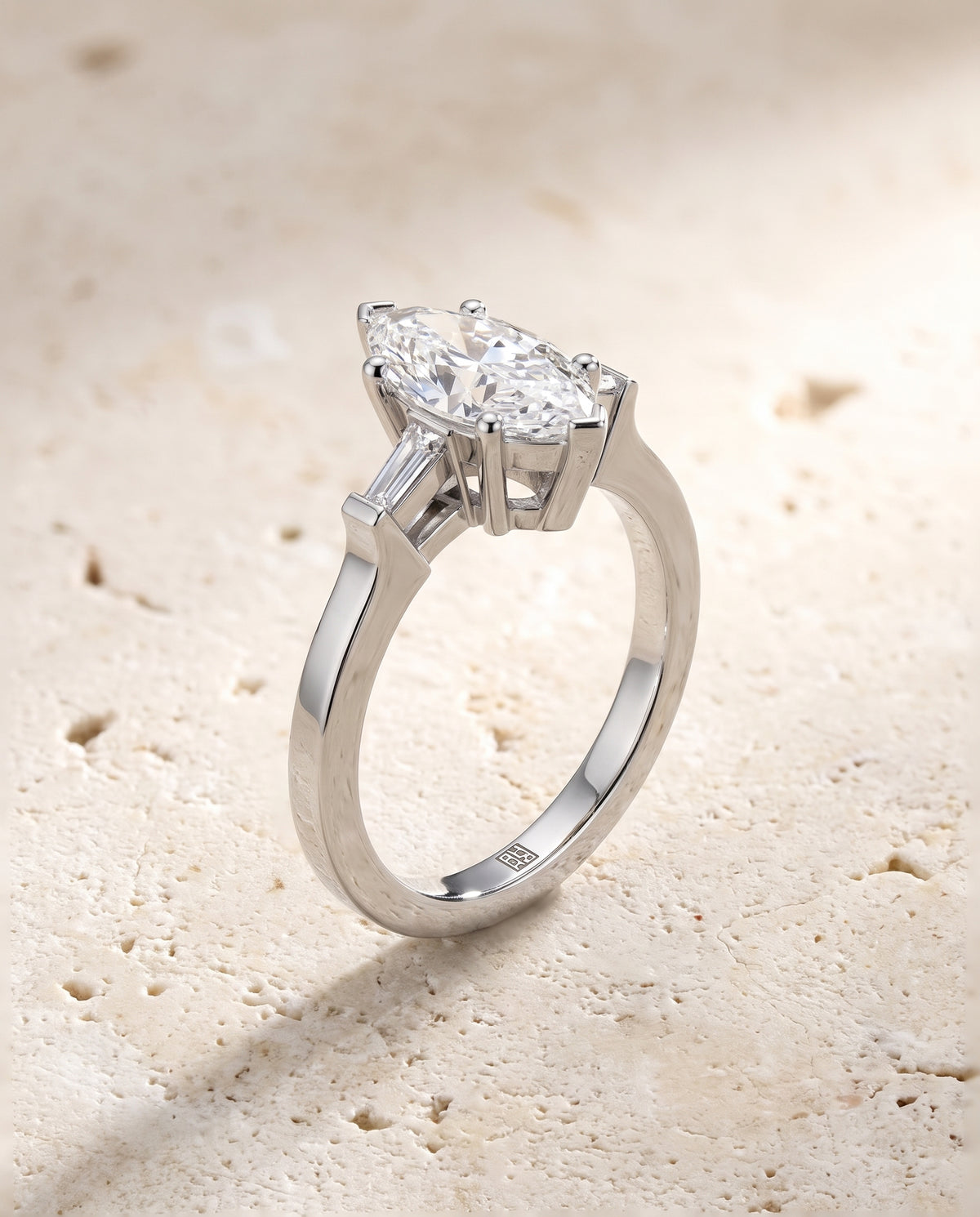 The June Three Stone Marquise Engagement Ring Setting in Platinum