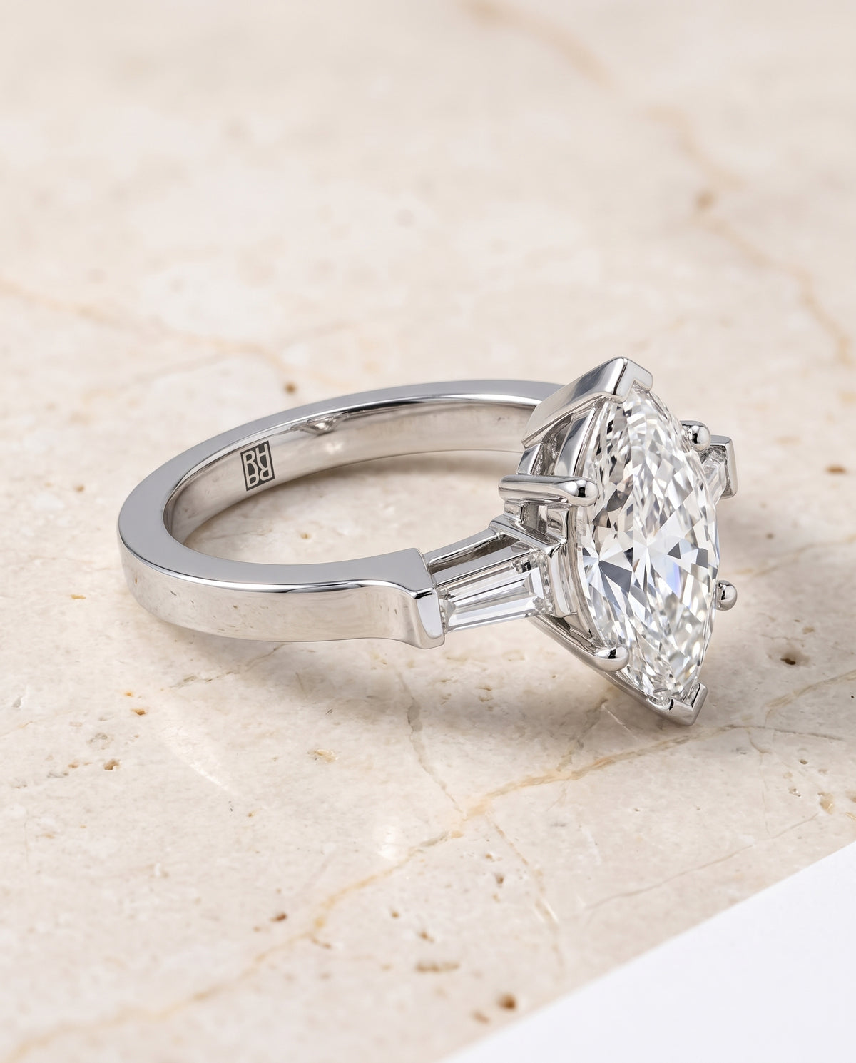 The June Three Stone Marquise Engagement Ring Setting in Platinum