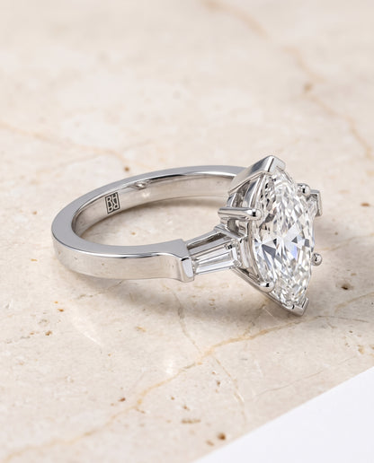 The June Three Stone Marquise Engagement Ring Setting in Platinum