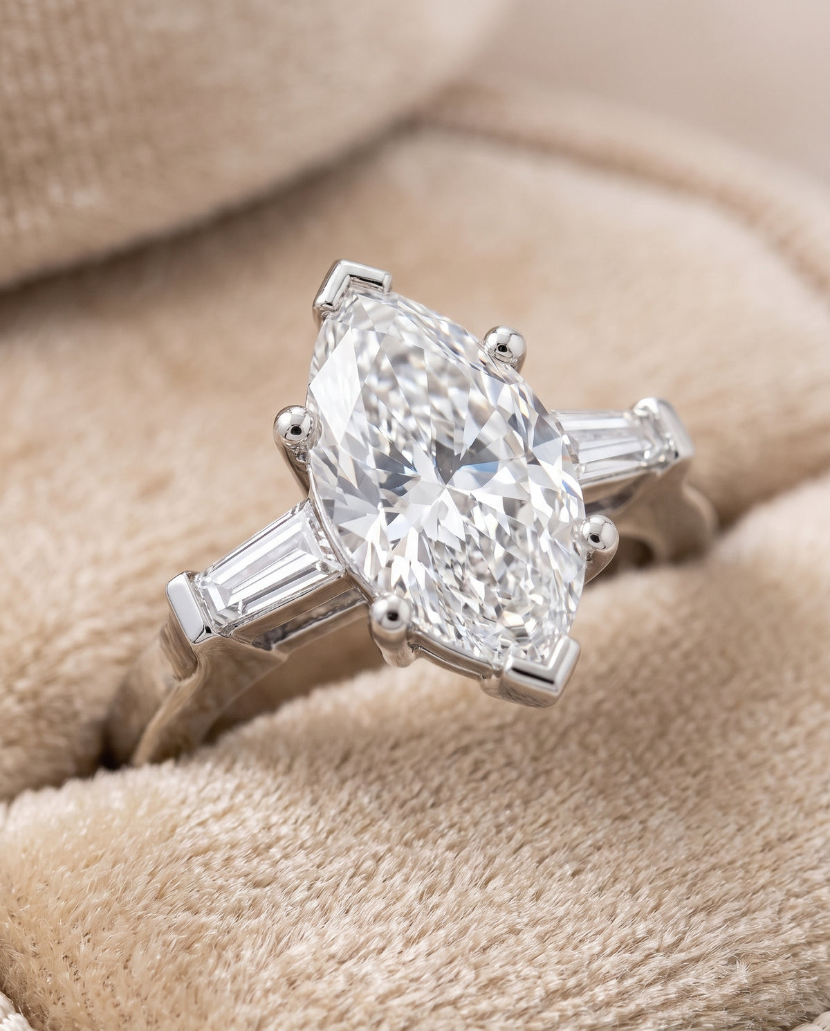 The June Three Stone Marquise Engagement Ring Setting in Platinum