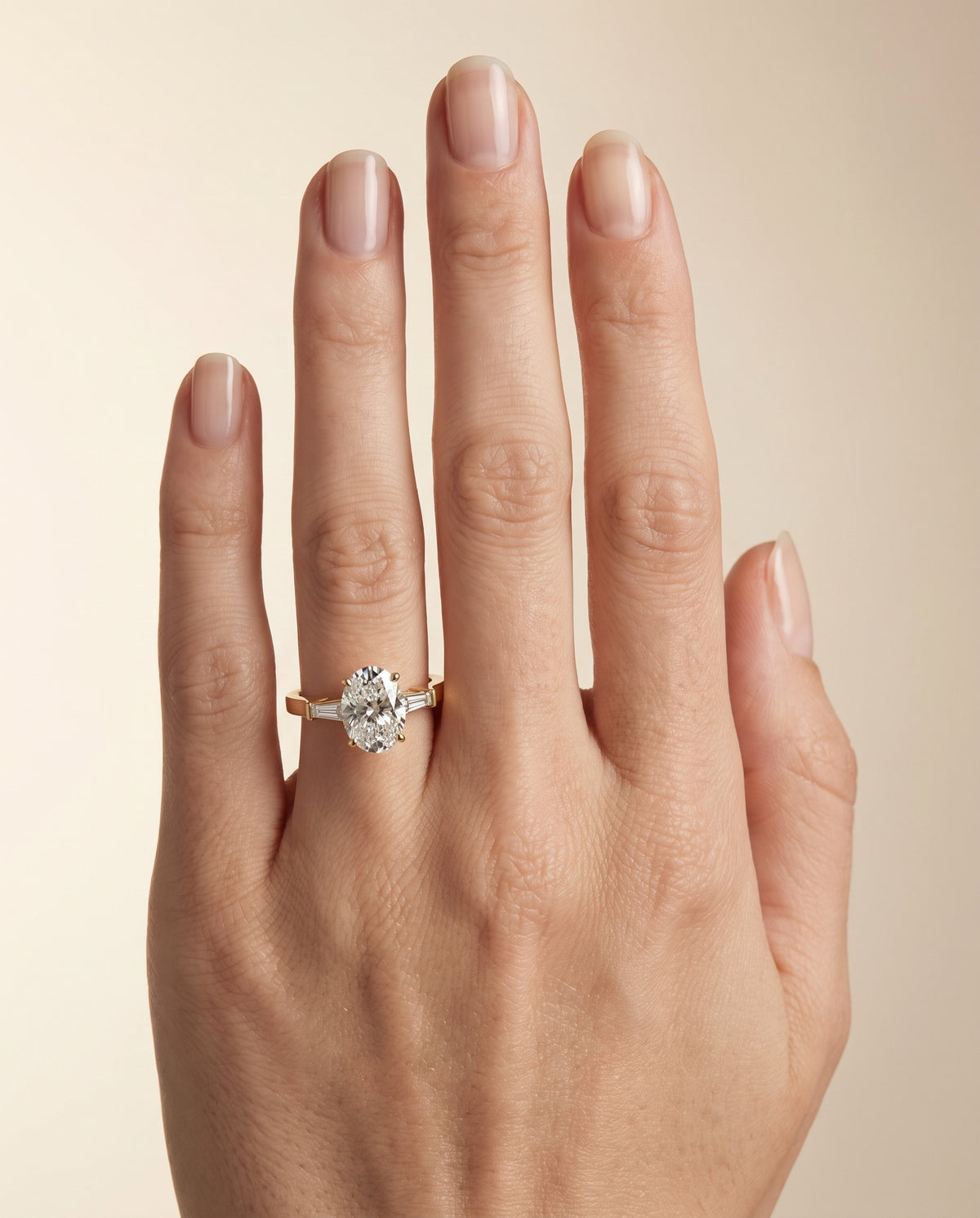 The June Three Stone Oval Engagement Ring Setting in 18K Yellow Gold
