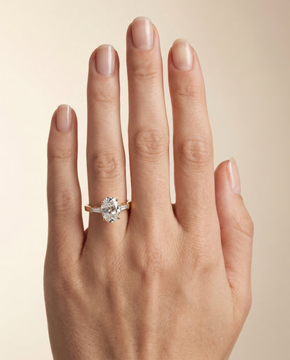 The June Three Stone Oval Engagement Ring Setting in 18K Yellow Gold