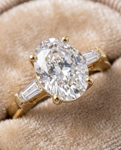 The June Three Stone Oval Engagement Ring Setting in 18K Yellow Gold