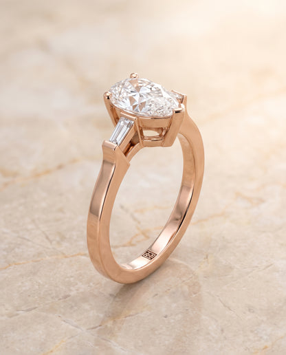 The June Three Stone Pear Engagement Ring Setting in 14K Rose Gold