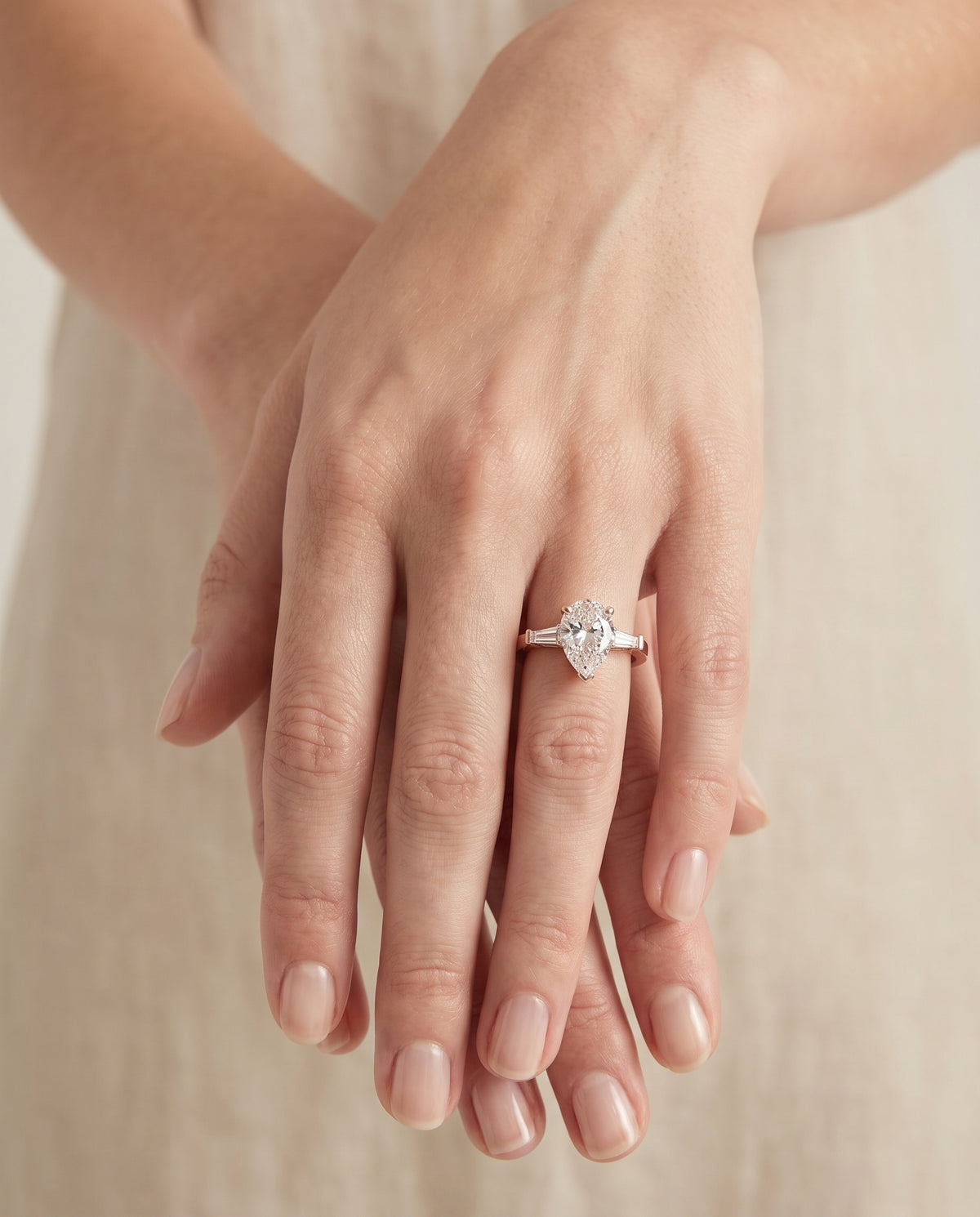 The June Three Stone Pear Engagement Ring Setting in 14K Rose Gold