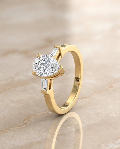 The June Three Stone Pear Engagement Ring Setting in 18K Yellow Gold