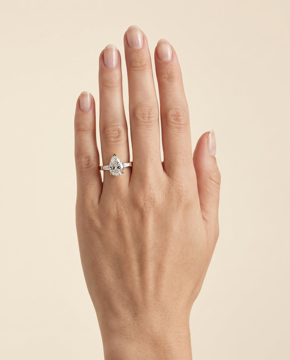 The June Three Stone Pear Engagement Ring Setting in 18K Yellow Gold
