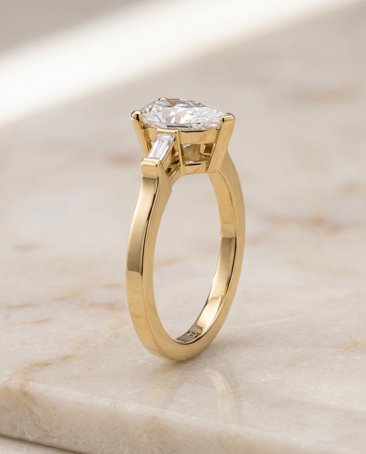The June Three Stone Pear Engagement Ring Setting in 18K Yellow Gold