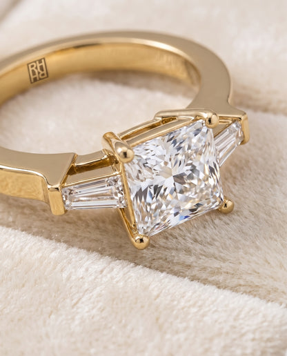 The June Three Stone Princess Cut Engagement Ring Setting in 18K Yellow Gold
