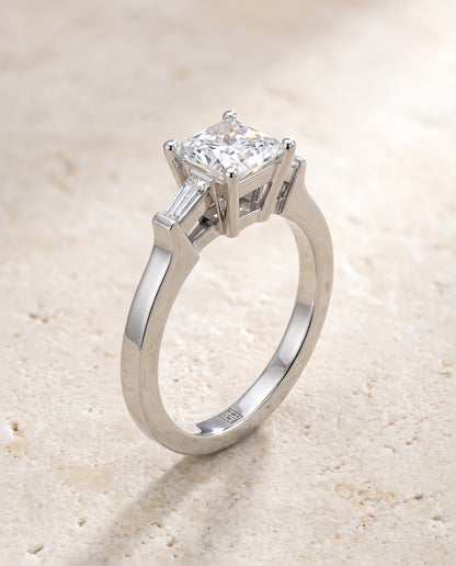The June Three Stone Princess Cut Engagement Ring Setting in Platinum