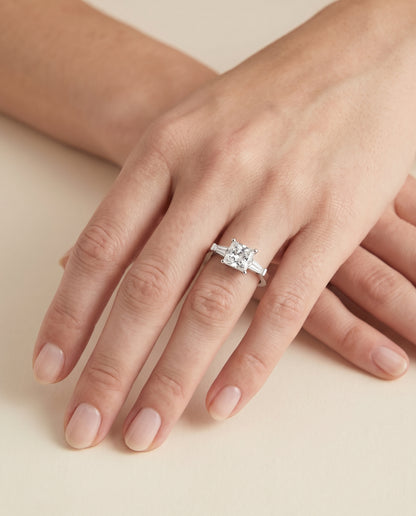The June Three Stone Princess Cut Engagement Ring Setting in Platinum