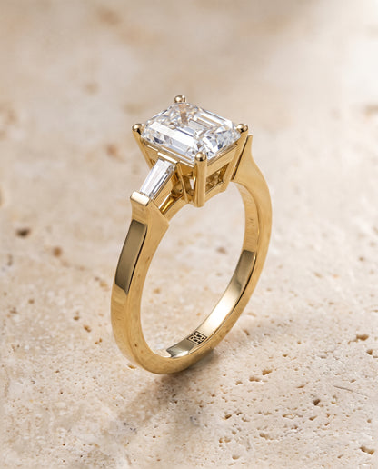 The June Three Stone Radiant Cut Engagement Ring Setting in 18K Yellow Gold