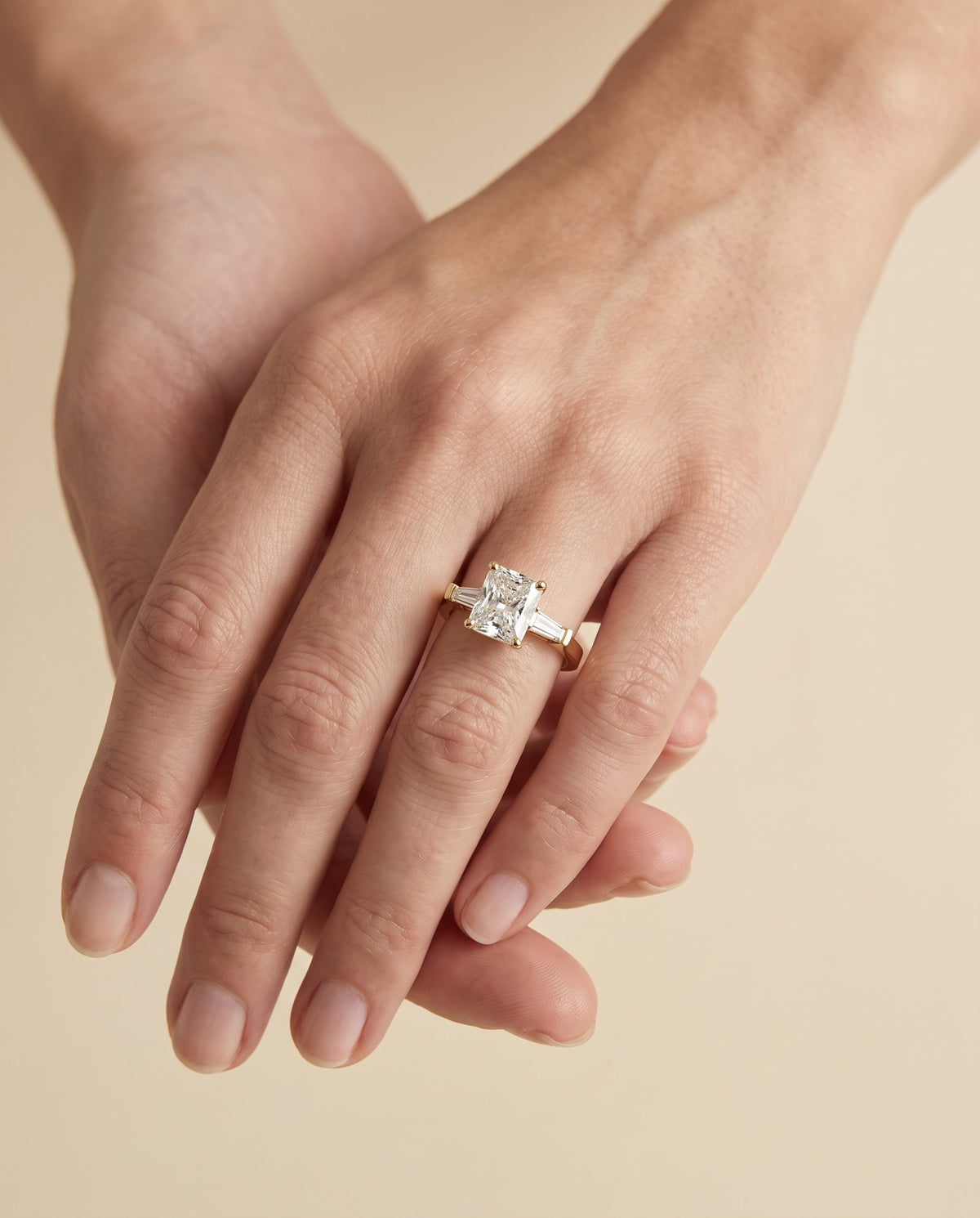 The June Three Stone Radiant Cut Engagement Ring Setting in 18K Yellow Gold