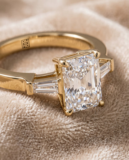 The June Three Stone Radiant Cut Engagement Ring Setting in 18K Yellow Gold