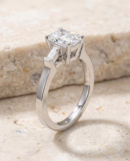 The June Three Stone Radiant Cut Engagement Ring Setting in Platinum